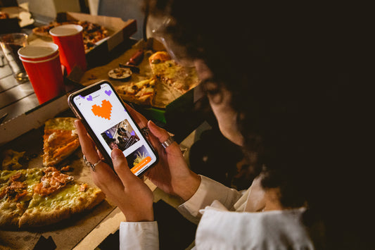 A woman creating a Lovebox Message on her phone.