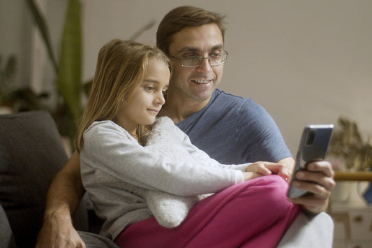 A divorced parent video chatting with a child from home