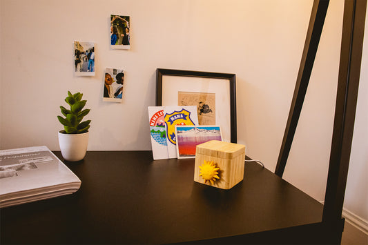 A long distance Lovebox sitting on the counter.